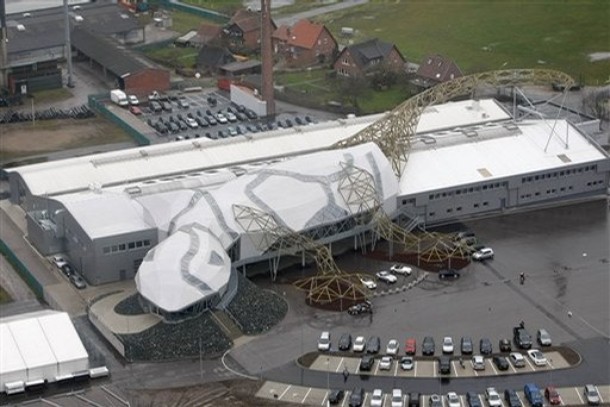 The company's logo, a gecko, is seen in an aerial view as it is integrated into the architecture of the new factory hall of German sport car manufacturer company Wiesmann in Duelmen, Germany, Wednesday, April 2, 2008. Wiesmann creates and handcrafts exclusive sport cars in a retro design based on modified technology by BMW. (AP Photo/Martin Meissner)